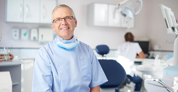 Dental office with Dentist smiling at you
