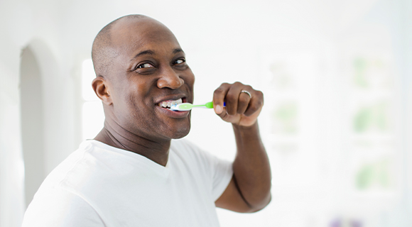 Man brushing his teeth